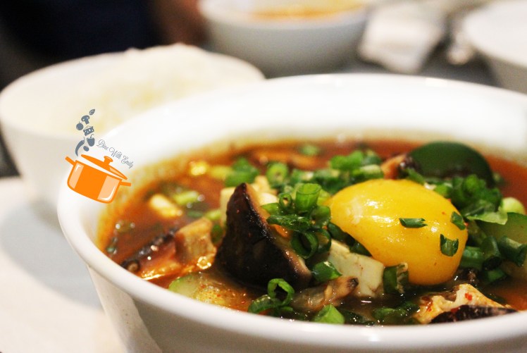 Korean bean curd. A strong and rich soup based dish consists of mushroom, clam, fresh tofu, and runny yolk (so yum!!!)