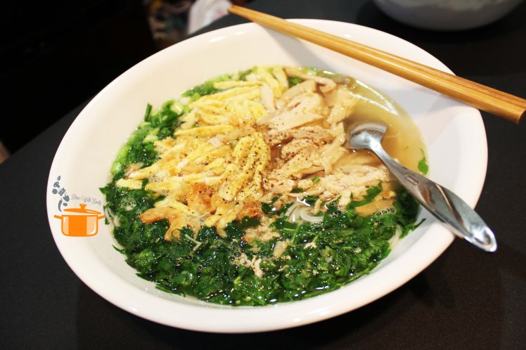 Special dish from Hanoi, bún thang: a combination of chicken broth, torn chicken thigh, sliced fried egg, dried shrimp (finely grinded), and sliced pork cake 